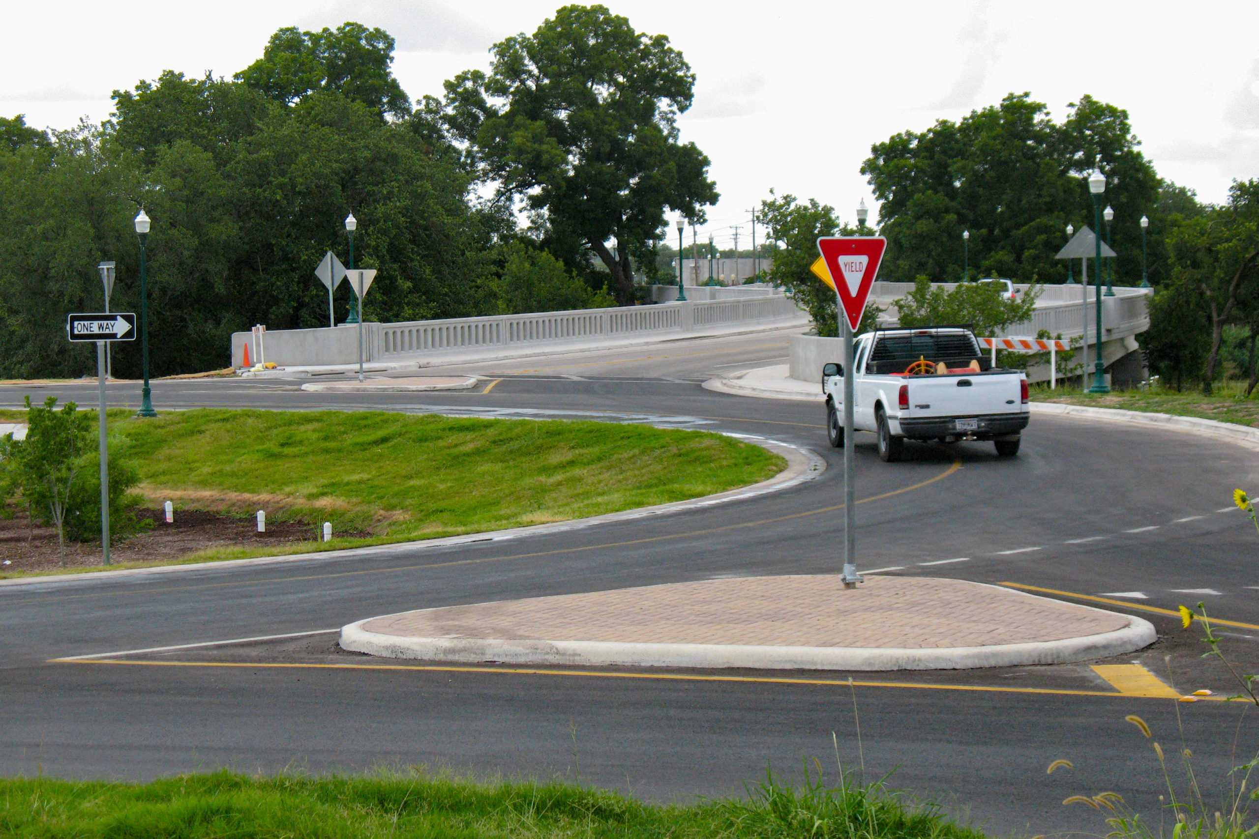 Roundabout with white truck in circle