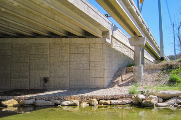 View of Utility Bridge Over Bull Creek from river bank