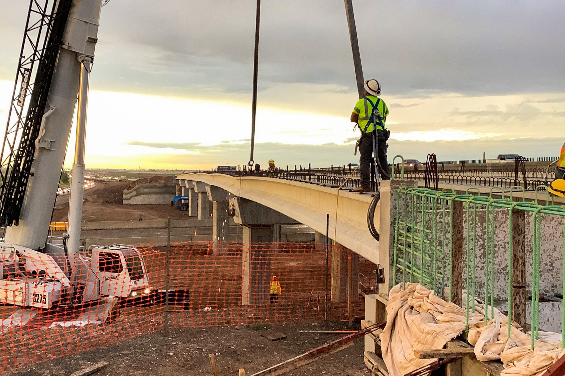 Worker navigating crane at Bridge construction at SL 335
