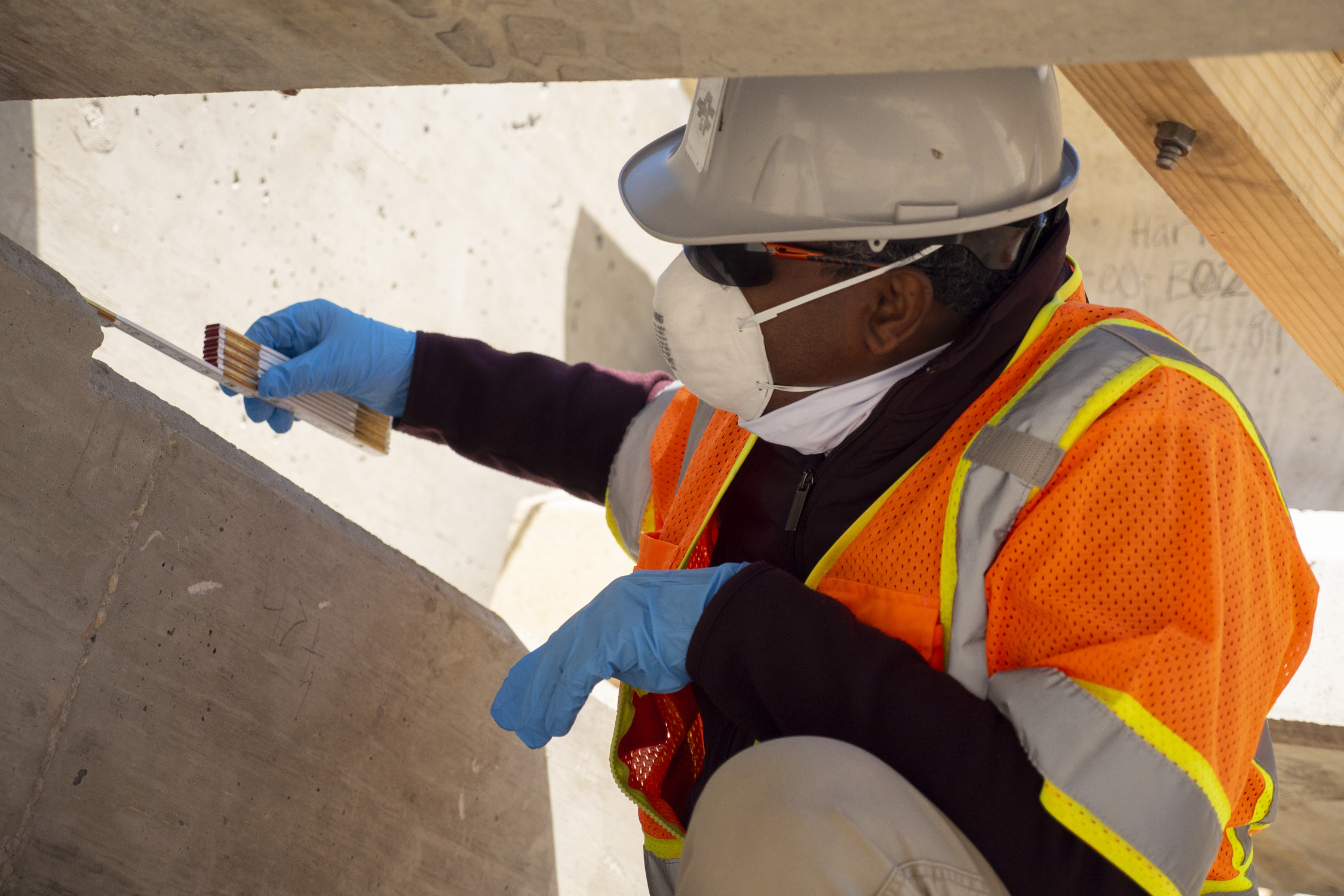 Construction team member reviewing project site